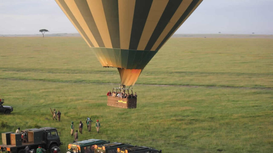 Hot air balloons over the Masai Mara during an aerial safari with African Affarble Expedition Limited.