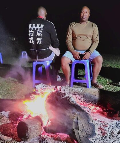 Campers relaxing near a bonfire on a Nairobi Aberdare Samburu Meru Laikipia mobile camping safari