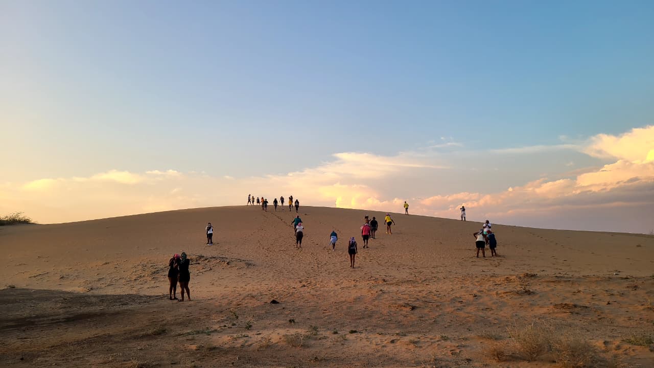 Tourists Having Fun at Chalbi Deswrts Sand Dunes During The 8 Days Ndoto, Kalacha,Loiyangalani Safari Expedition