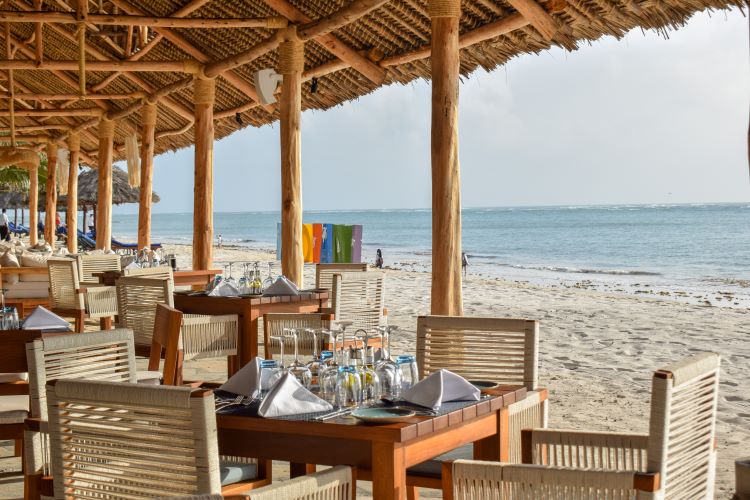 Sandy Beach Relaxation – 8-Day Luxury Honeymoon Safari & Beach Holiday Sandy beach with relaxing chairs during an 8-Day Luxury Honeymoon Safari & Beach Holiday in Kenya